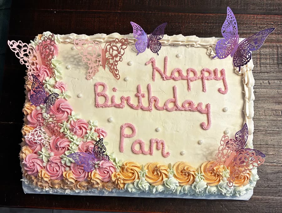 Birthday sheet cake with buttercream roses and butterflies